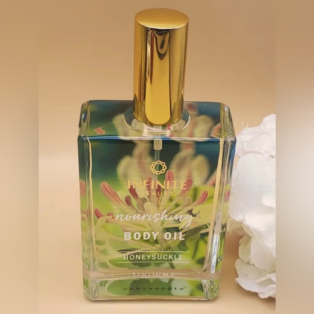 🔥 New, Infinite Beauty Nourishing body oil Honeysuckle scented.